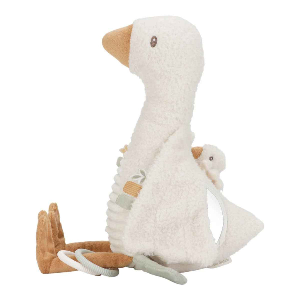 Activity goose with child safe mirror and sensory toys on a white background