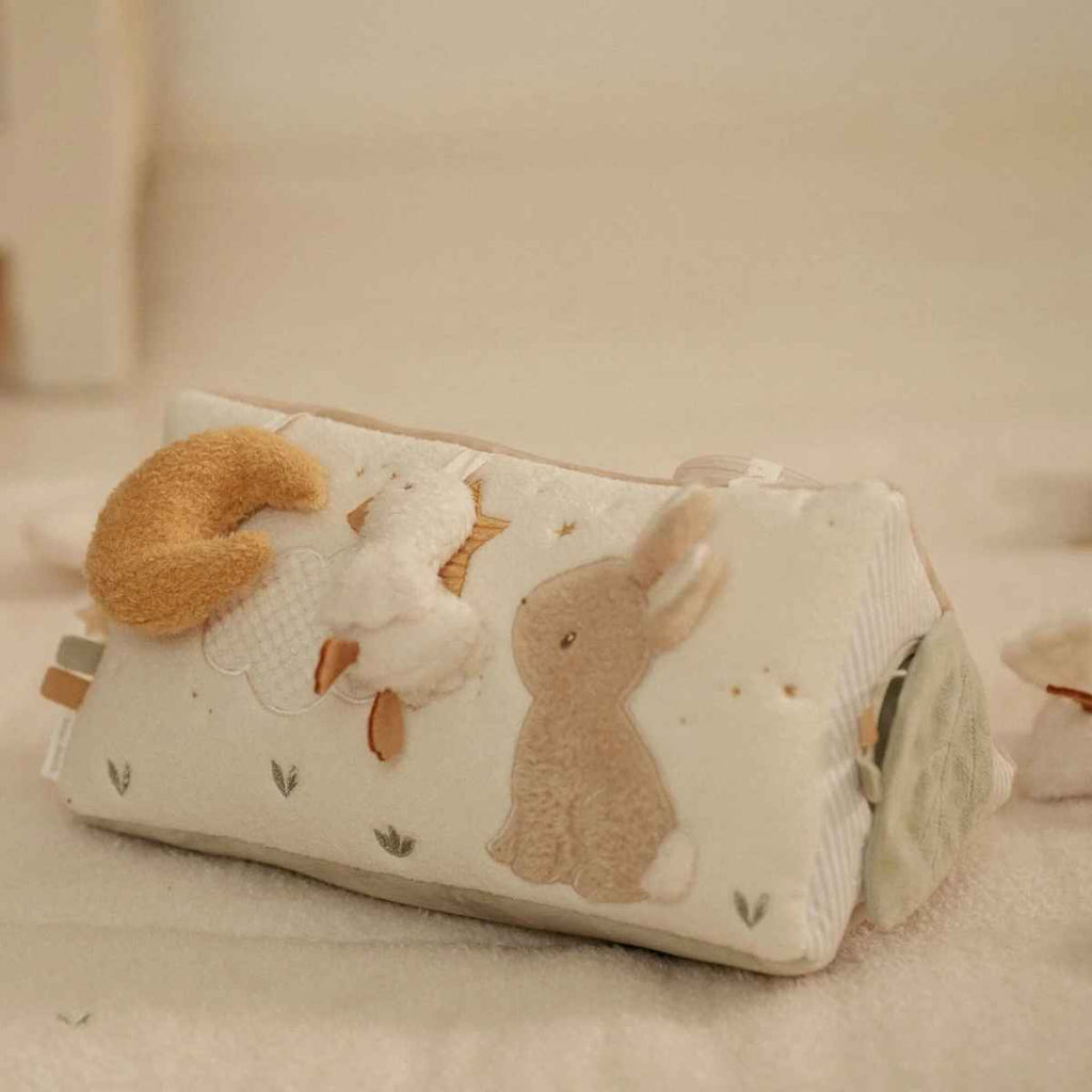 Activity triangle with rabbit and goose design on a soft surface