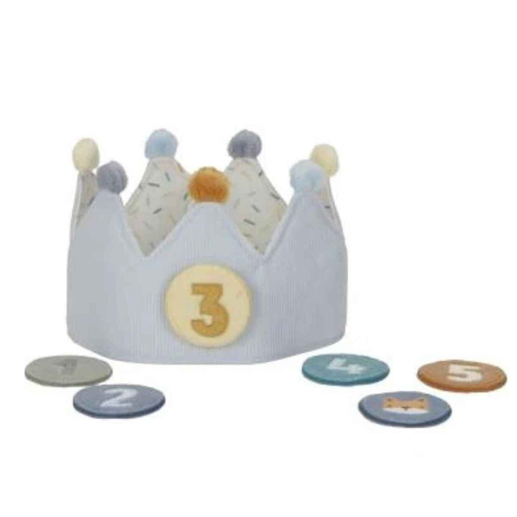 Children's crown with number 3 and colorful patches on a white background