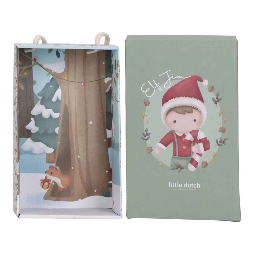 Product packaging with a Christmas-themed design featuring an elf and a tree in a winter setting, branded 'Little Dutch'.