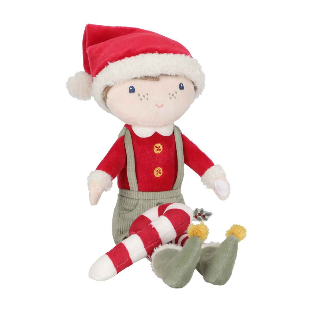 Plush toy elf in a red outfit with a candy cane on a white background