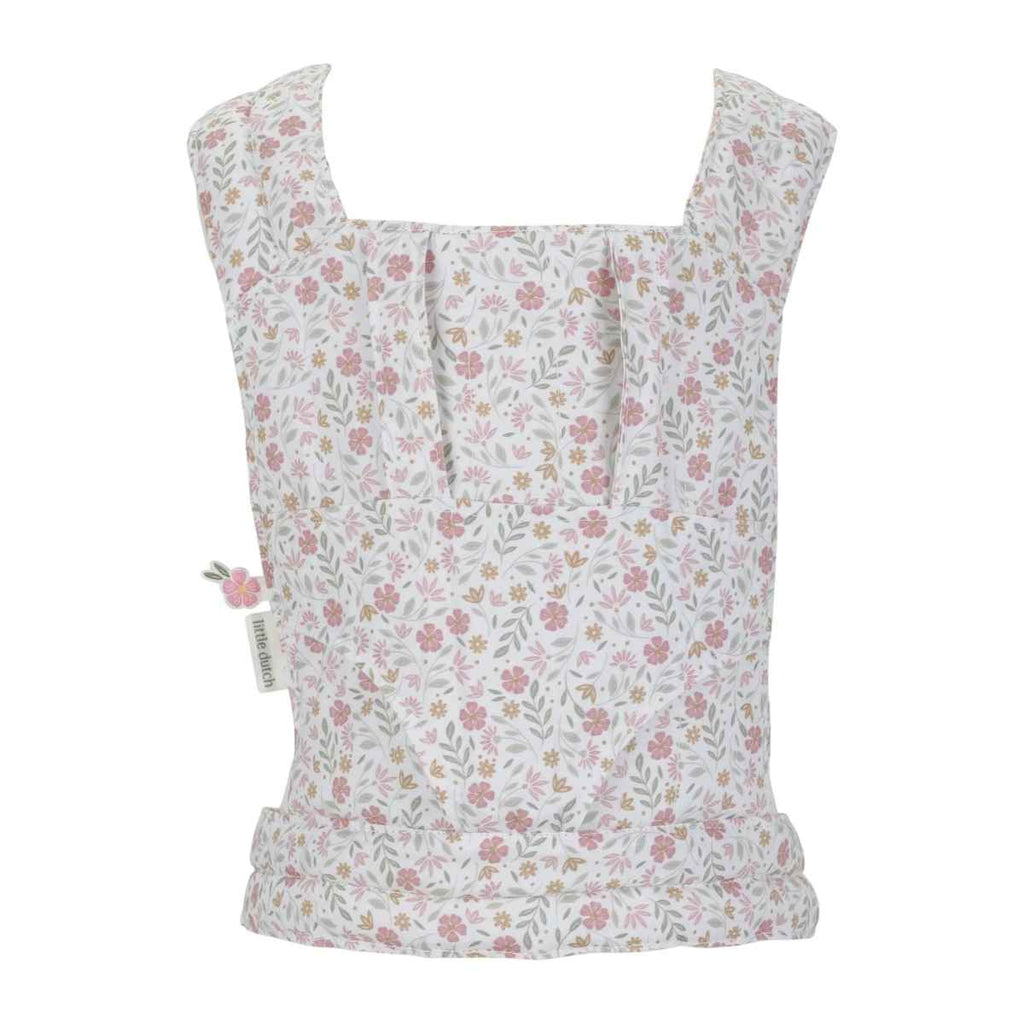 Floral-patterned baby doll carrier on a white background