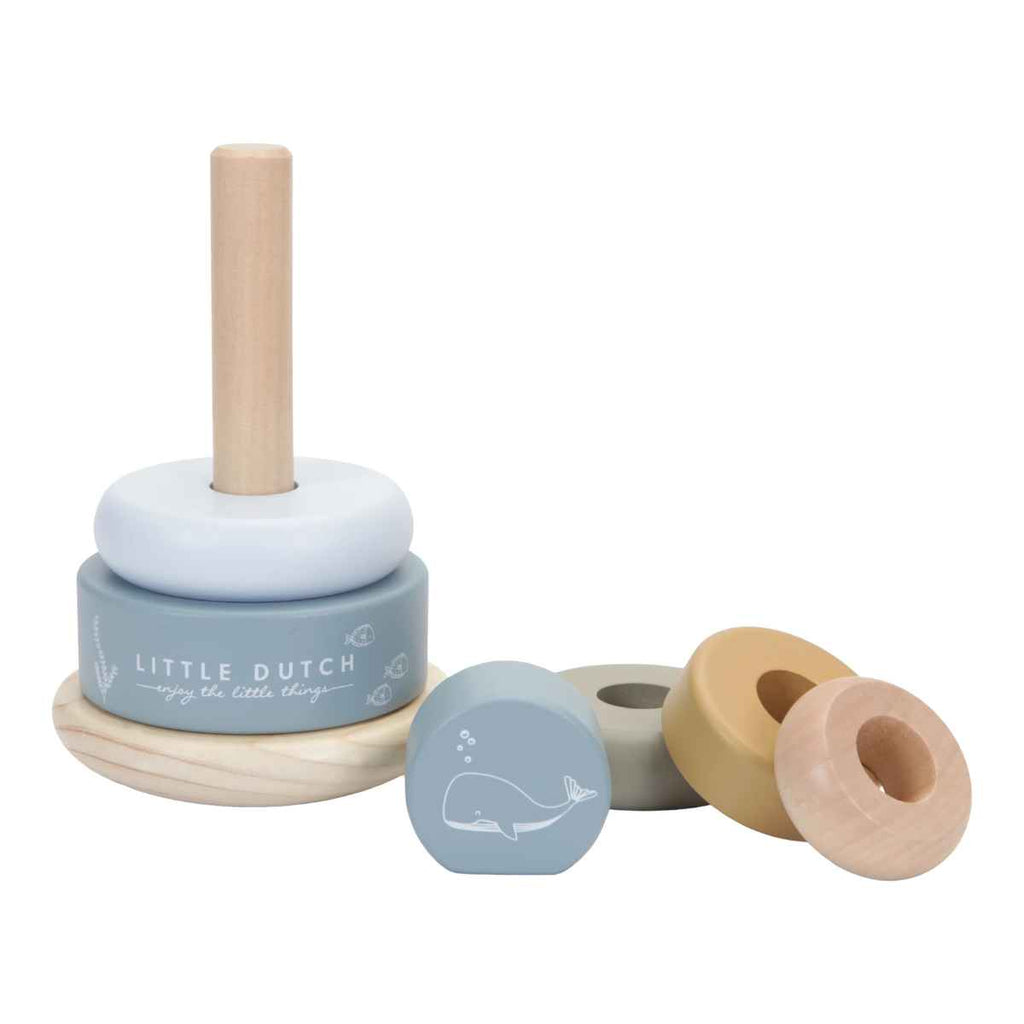 Wooden rocking ring stacker with pieces unstacked on a white background.