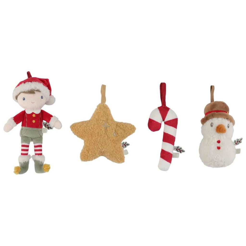 Set of Christmas-themed toys including a toy elf, star ornament, candy cane, and snowman on a white background.