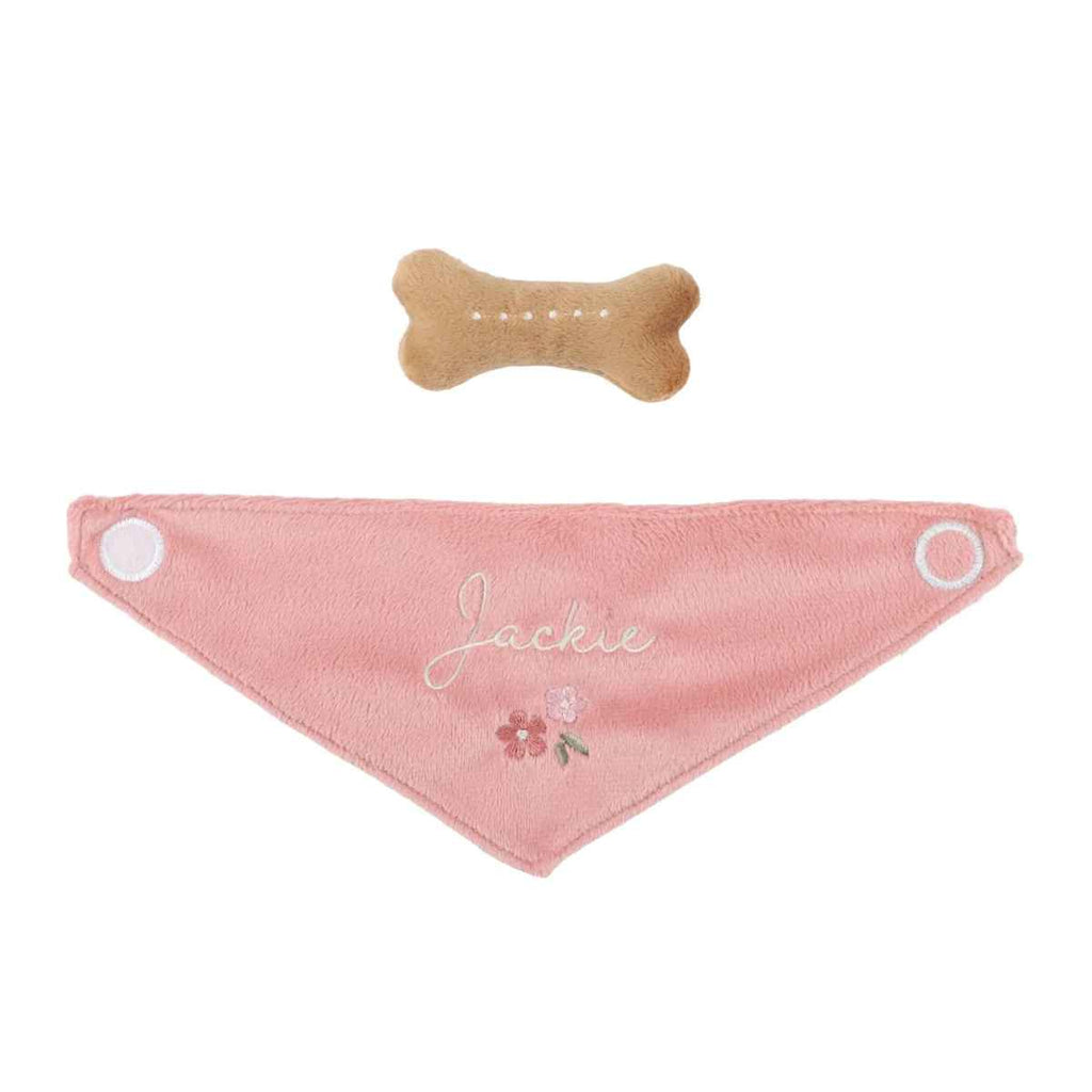 Pink dog bandana with embroidered name and bone-shaped treat on a white background