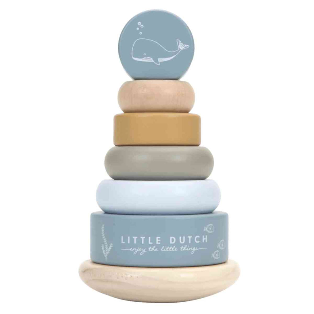 Stack of wooden rings with a whale illustration on a blue top, branded 'Little Dutch'.