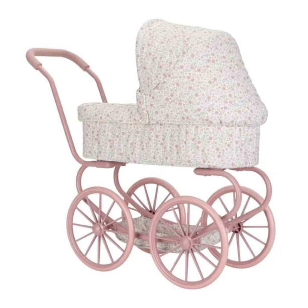 Pink doll pram with floral patterned cot seat on a white background
