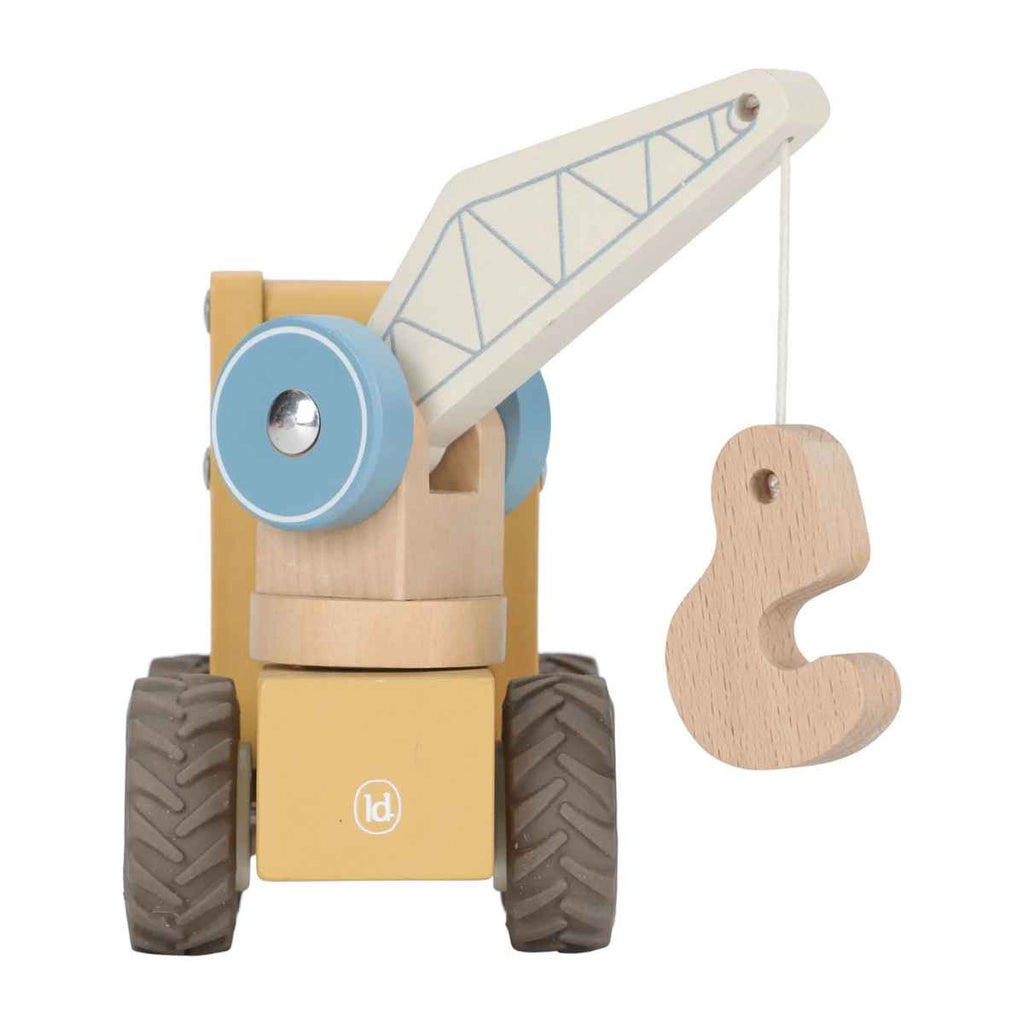 Wooden toy crane with a hook on a white background