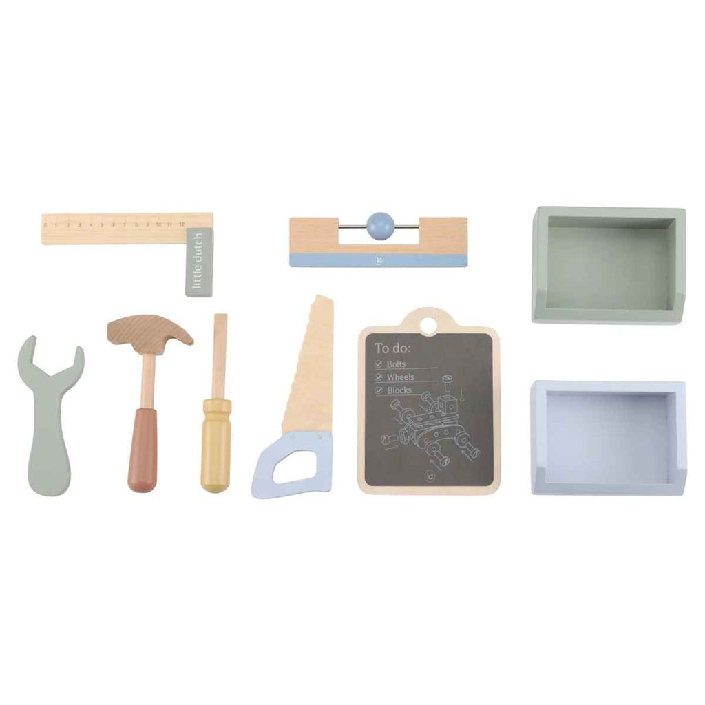Set of wooden toy tools and accessories on a white background