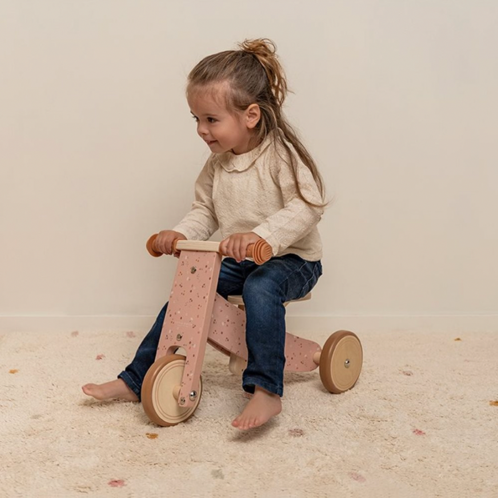 Little Dutch | Girl Riding On Pink Tricycle | Patterned | Pink | Wooden Tricycle | ChocoLoons