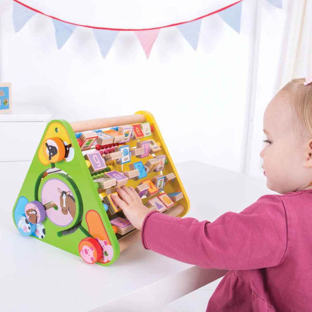 Bigjigs | Baby Playing With Triangle Activity Centre | ChocoLoons