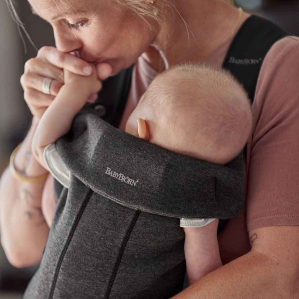 BabyBjörn | Mother Holding Baby In Carrier | Charcoal Grey | 3D Jersey | ChocoLoons