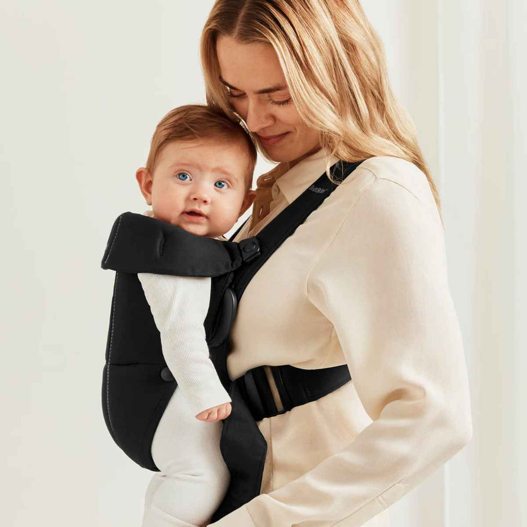 BabyBjörn | Mother Holding Baby In Carrier | ChocoLoons