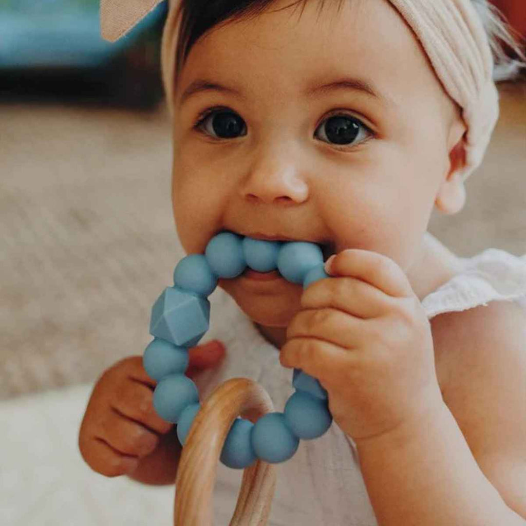 Jellystone Designs | Baby Chewing On Moon Teether | ChocoLoons