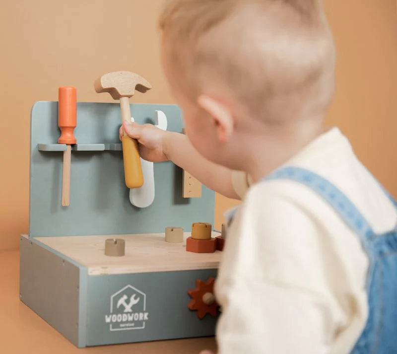 Little Dutch | Boy Playing With Wooden Mini Workbench | ChocoLoons