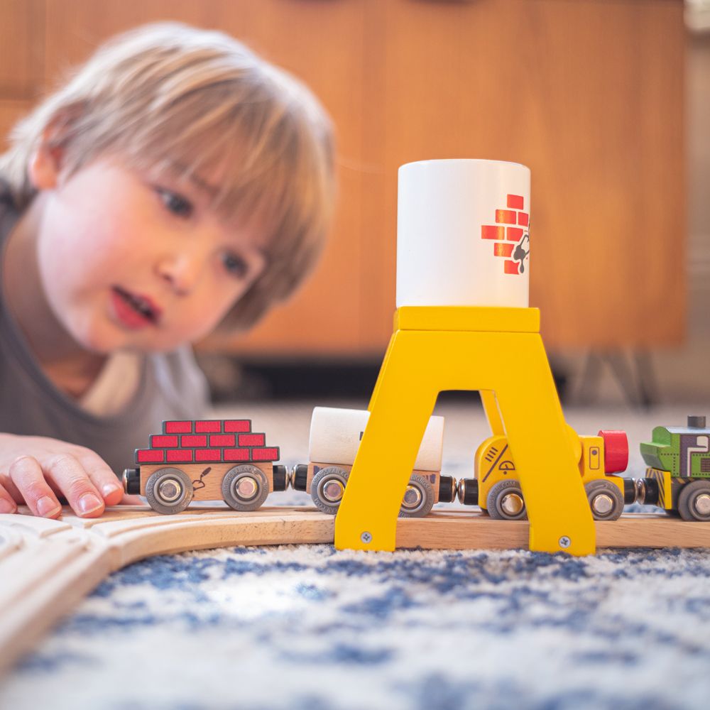 Boy Playing With A Bigjigs Wooden Construction Train | Chocoloons