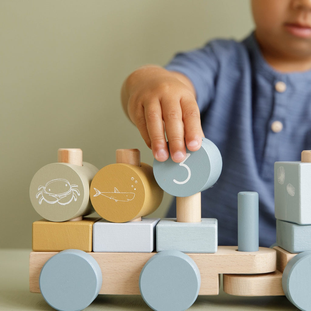 Boy Playing With Little Dutch Wooden Stacking Train | ChocoLoons