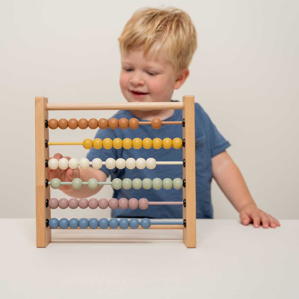 Boy Playing With Little Dutch Vintage Wooden Abacus | ChocoLoons