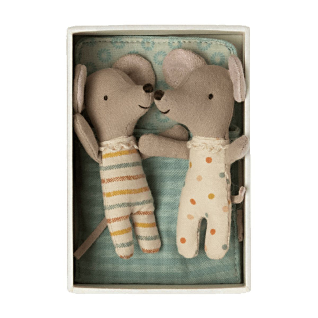 Maileg | Two small mice soft toys, one in a dotted outfit and one in a striped outfit | Laying on top of a miniature blue sleeping bag inside a matchbox | Chocoloons