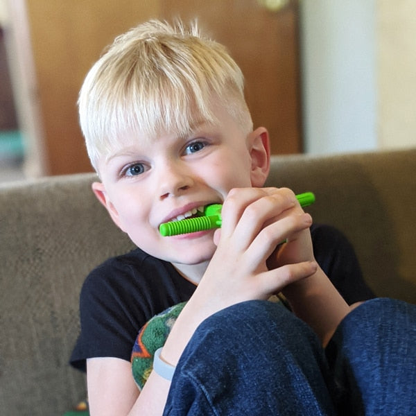 Ark Chewelry | Boy Using A Tetra Bite Chewy Fidget | Sensory Tool | Chocoloons