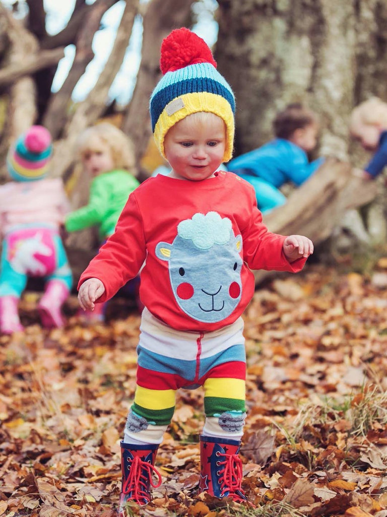 Blade & Rose | Little boy wearing rainbow striped leggings | Sheep face on the front of each leg | Chocoloons
