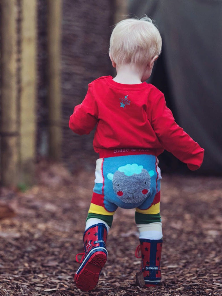 Blade & Rose | Little boy wearing rainbow striped leggings | Blue patch on the bum with a sheep face | Chocoloons